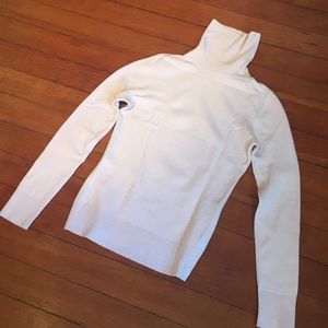 Pale pink turtleneck sweater